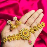 Antique Gold-Plated Floral Choker with Kundan and Jhumka Set