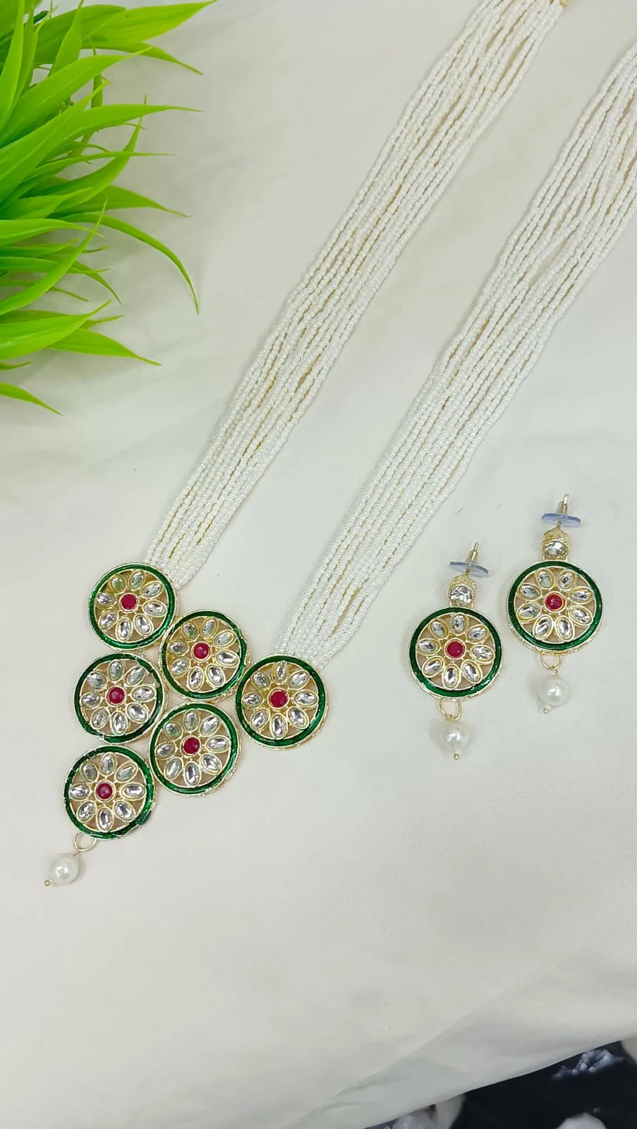 Ruby Kundan Minakari Multi-Strand Pearl Necklace Ruby Kundan Minakari Multi-Strand Pearl Necklace