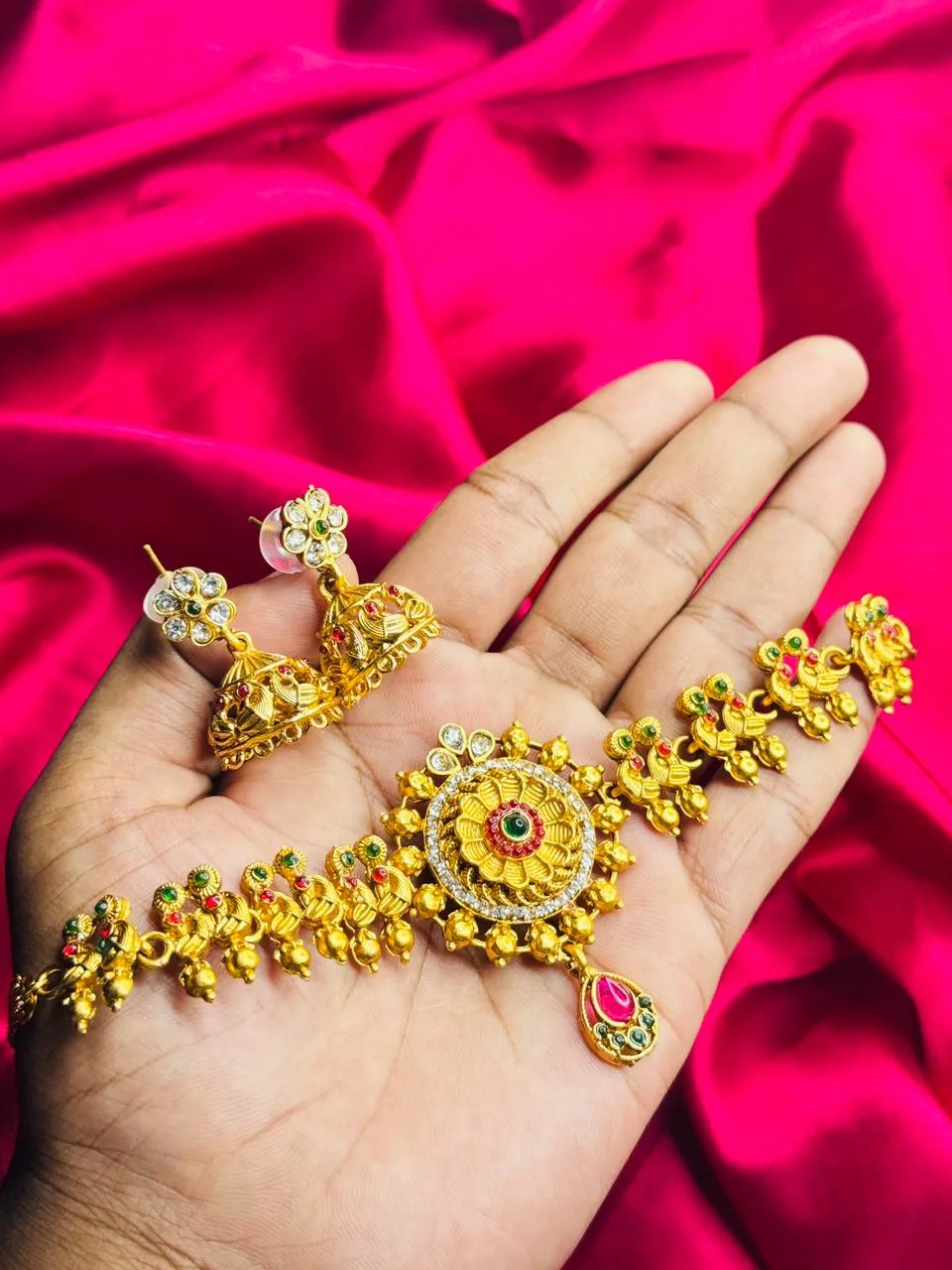 Antique Gold-Plated Floral Choker with Kundan and Jhumka Set Antique Gold-Plated Floral Choker with Kundan and Jhumka Set