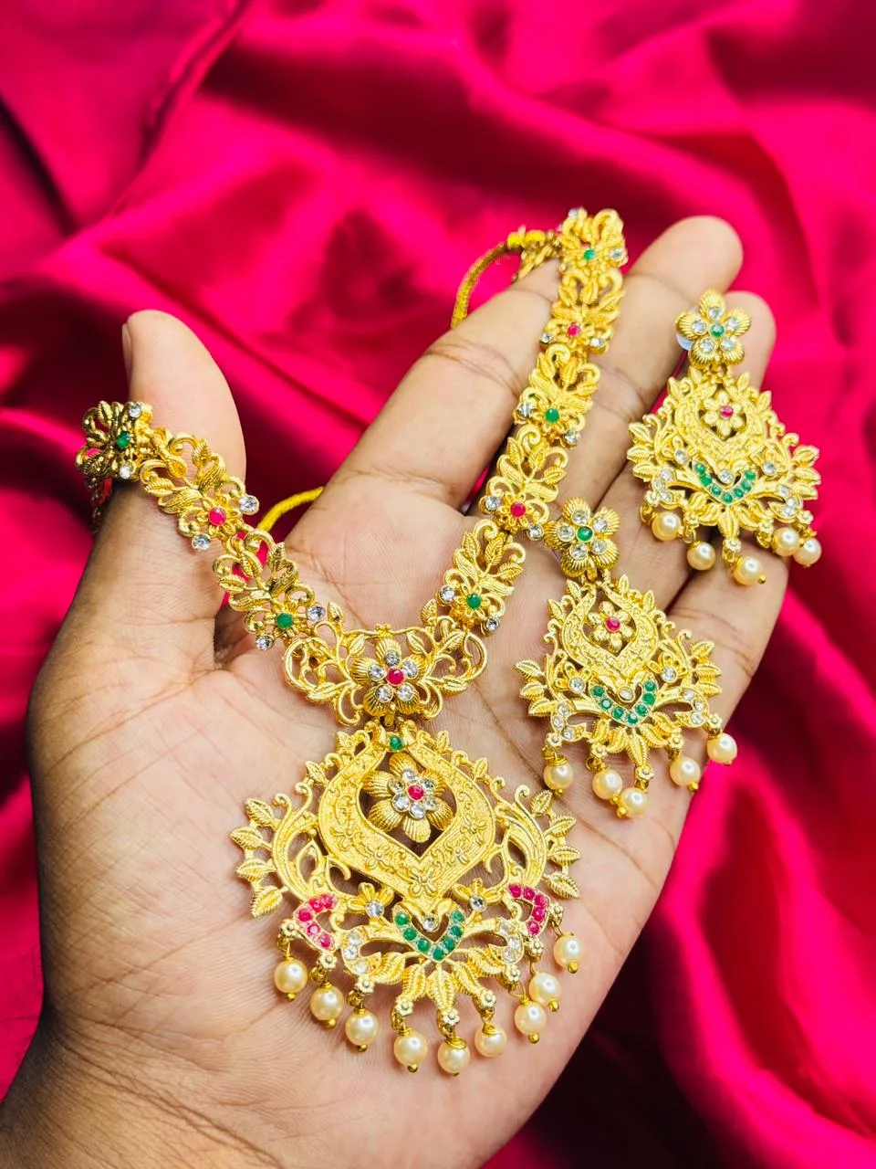 Antique Gold-Plated Long Pendant Set with Kundan and Pearl Drops Antique Gold-Plated Long Pendant Set with Kundan and Pearl Drops